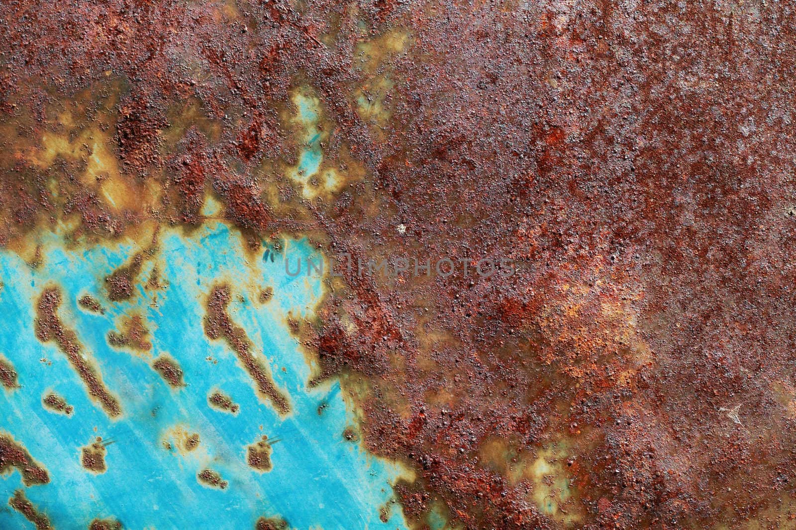 Grunge background of rusted blue metal.