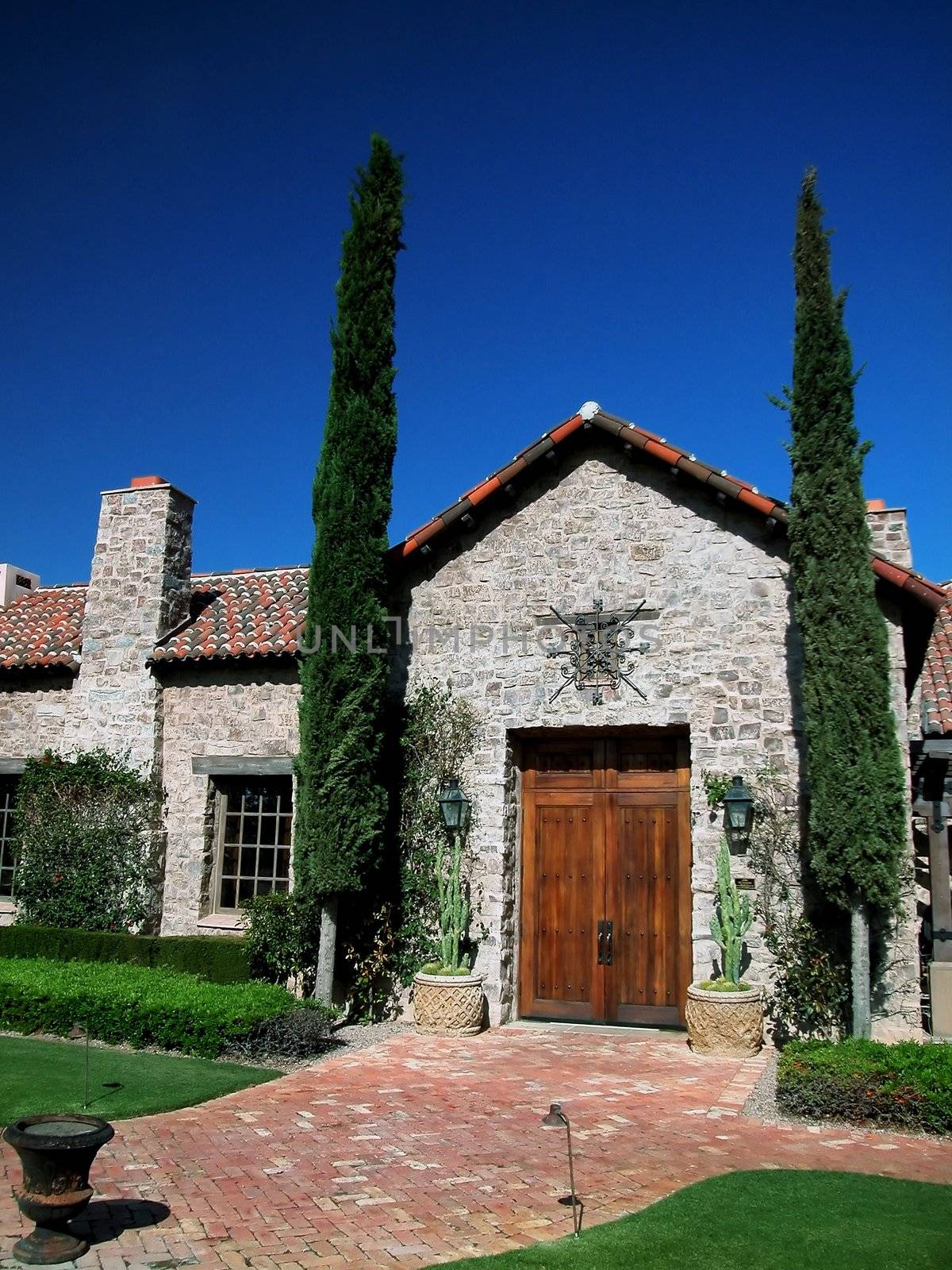 Entrance to a Spanish Style Villa with Blue Sky