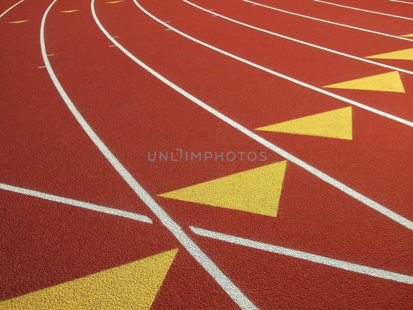 The Red Surface and White Lane Lines of a running track