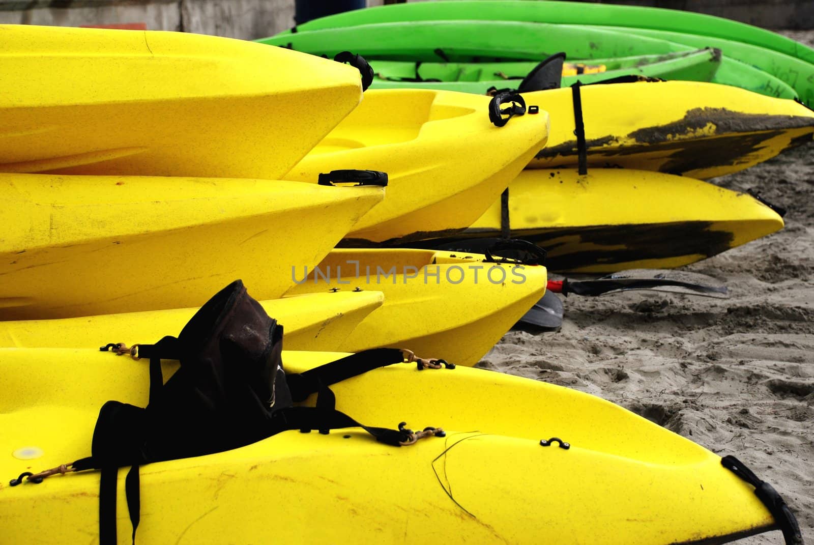 Yellow and Green Kayaks by pixelsnap