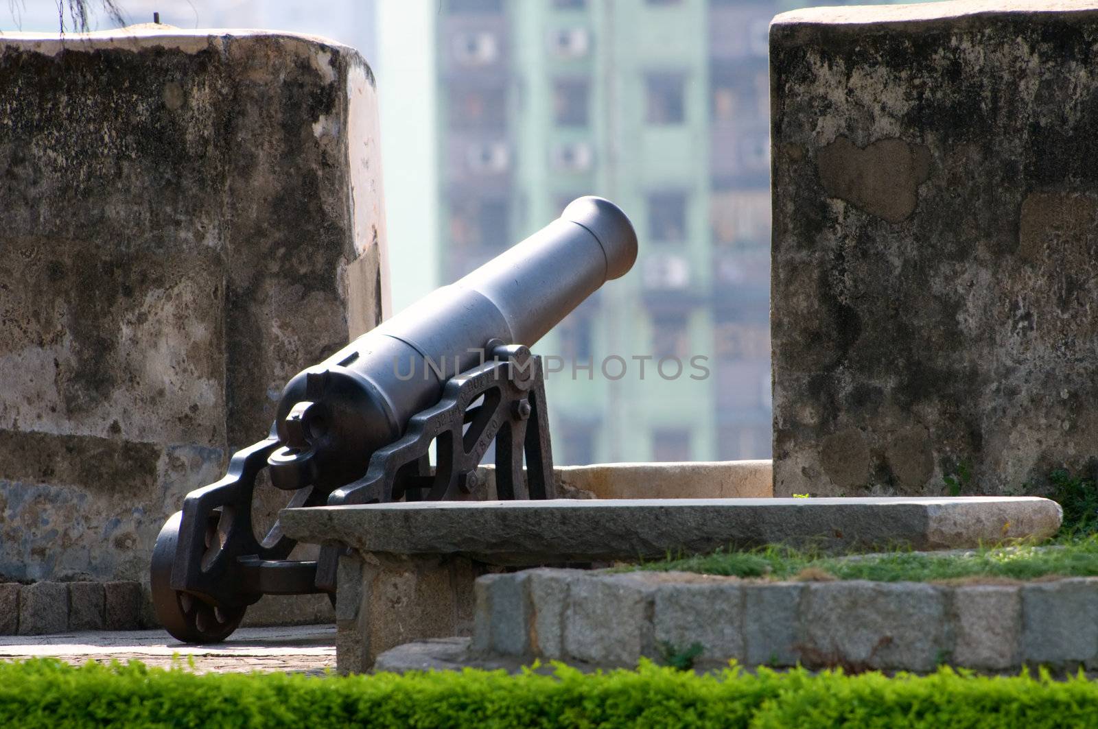 Black melal gun in the fortification
