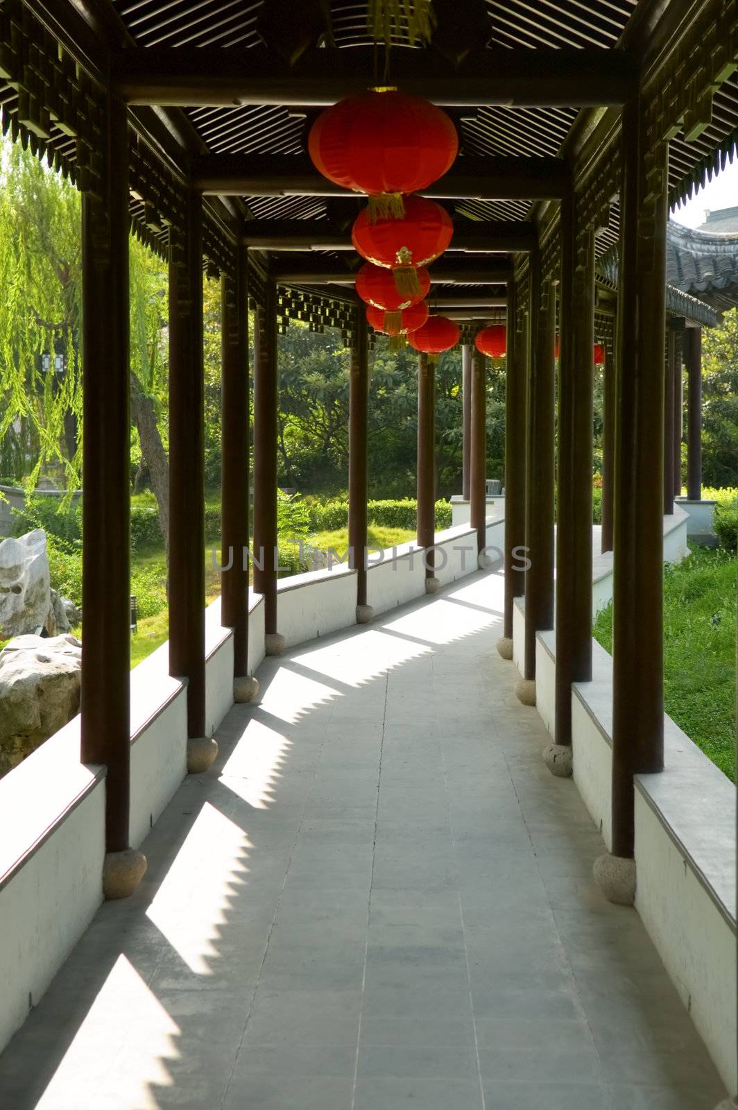 Beautiful traditional chinese wooden corridor structure with lanterns