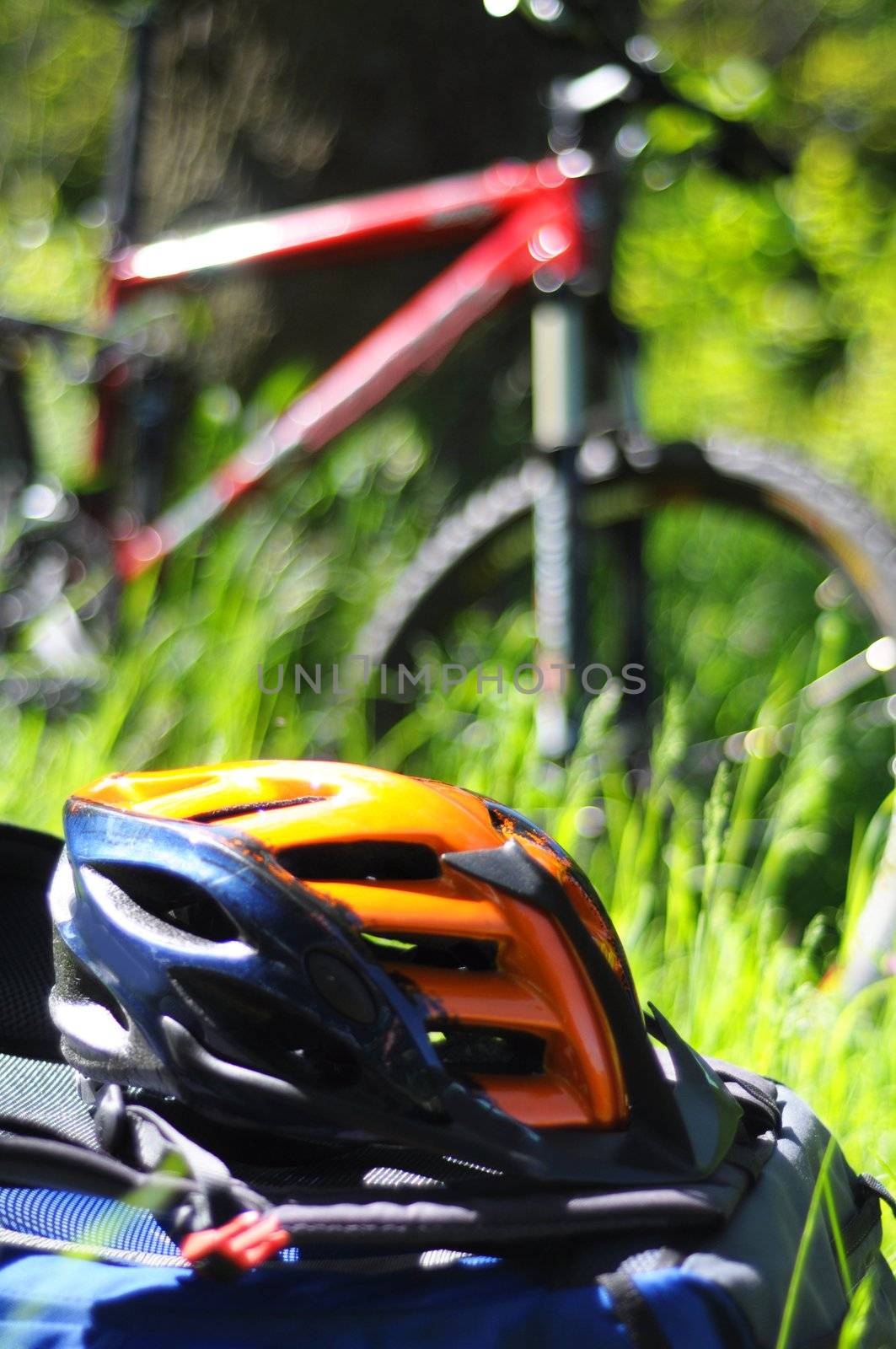 mountain bike with helmet showing safety or sports concept in nature