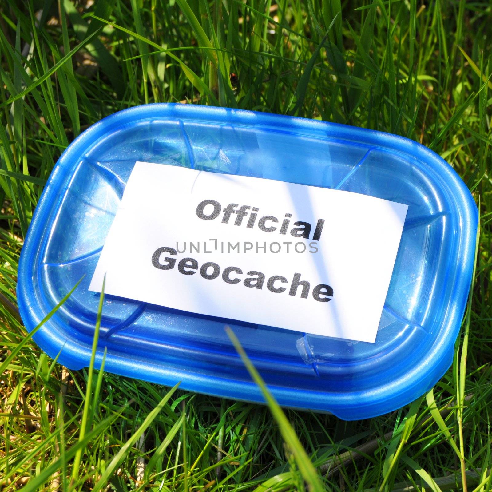 geocaching concept with cache box in nature