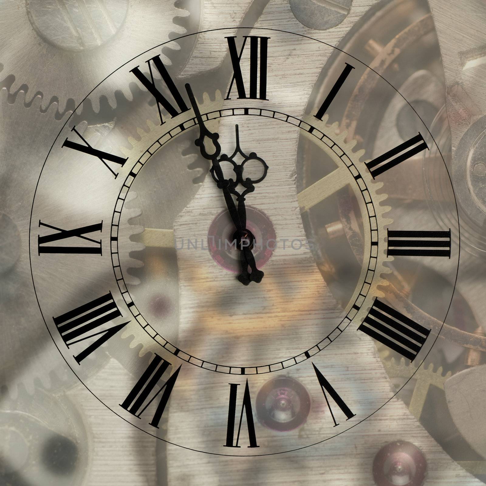 Old hours with figured arrows on mechanism blur background by galdzer