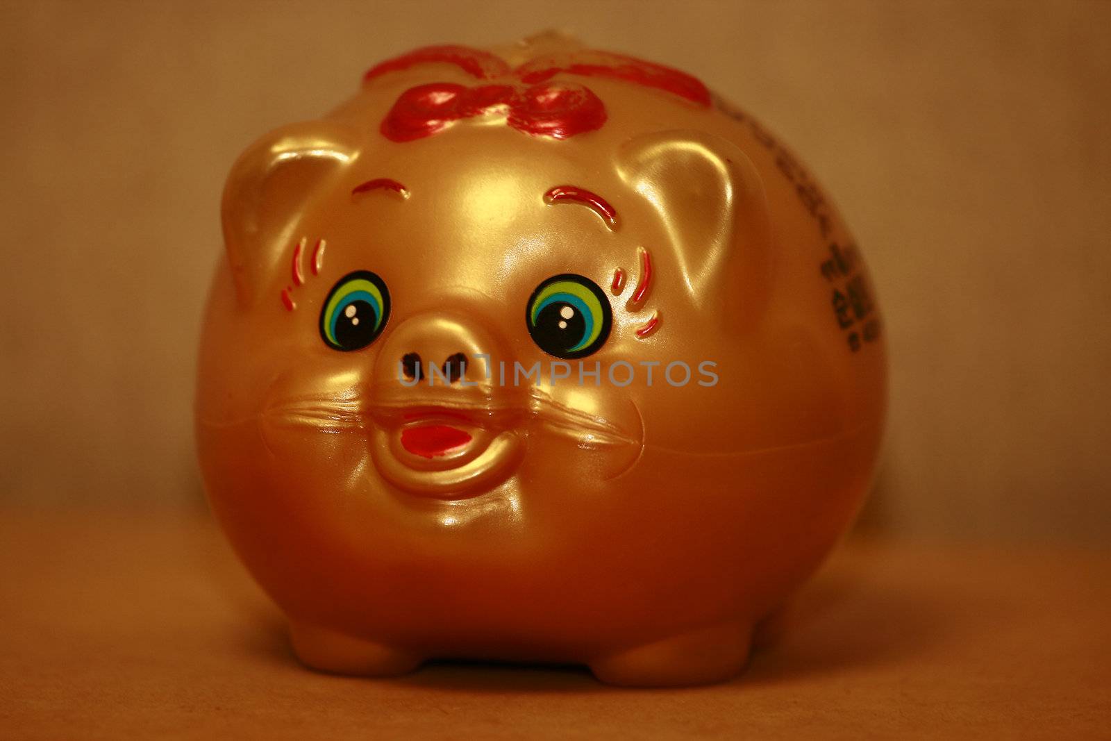 Isolated image of orange  piggy bank chinese design 