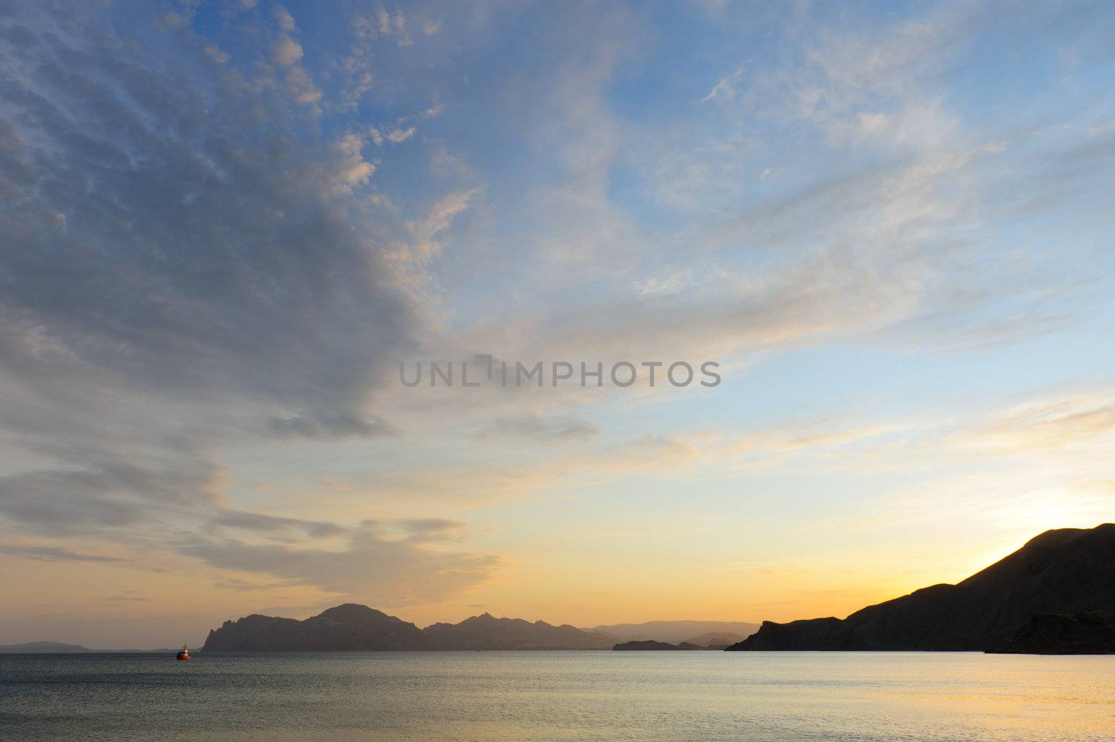 Sea landscape. An evening, the colourful sky