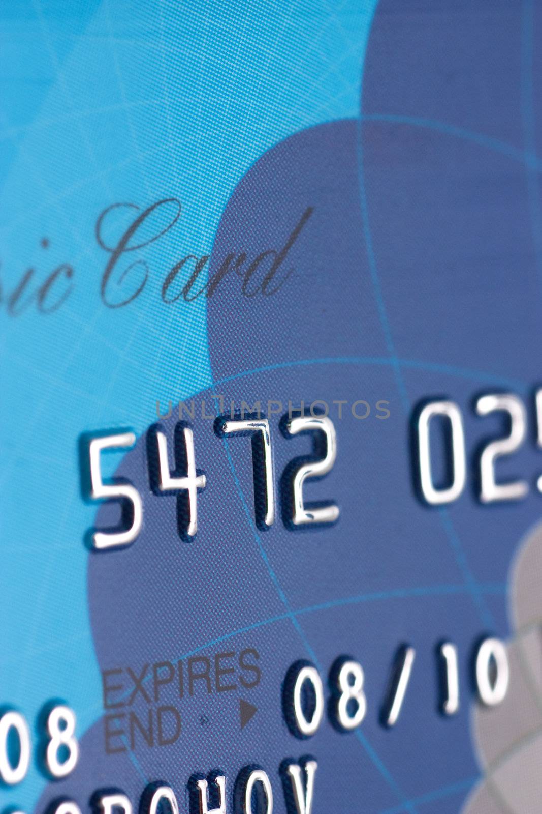 Macro view of credit card. Financial background.