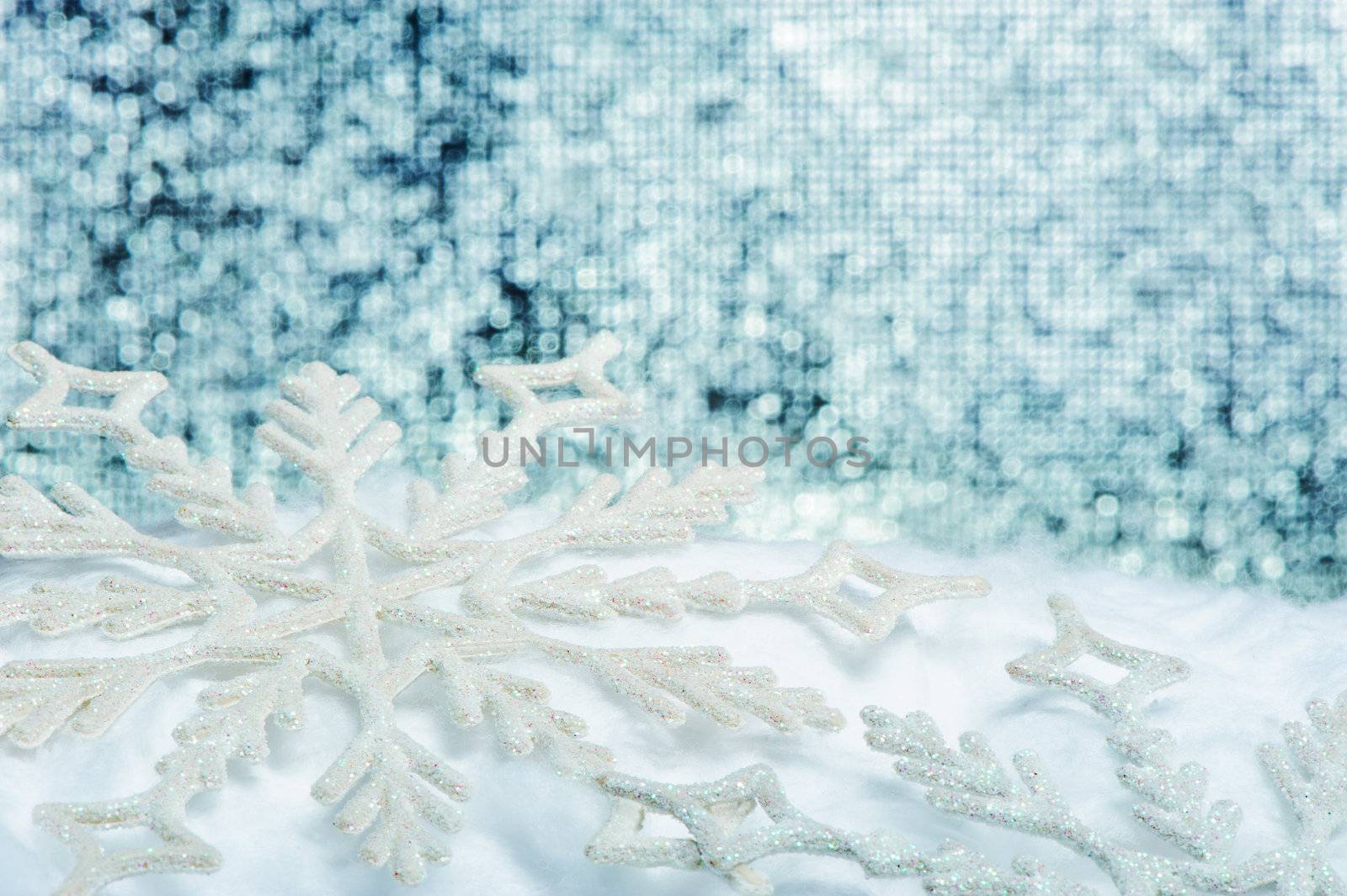 Snowflake big close up. Bokeh a background. Toning is blue