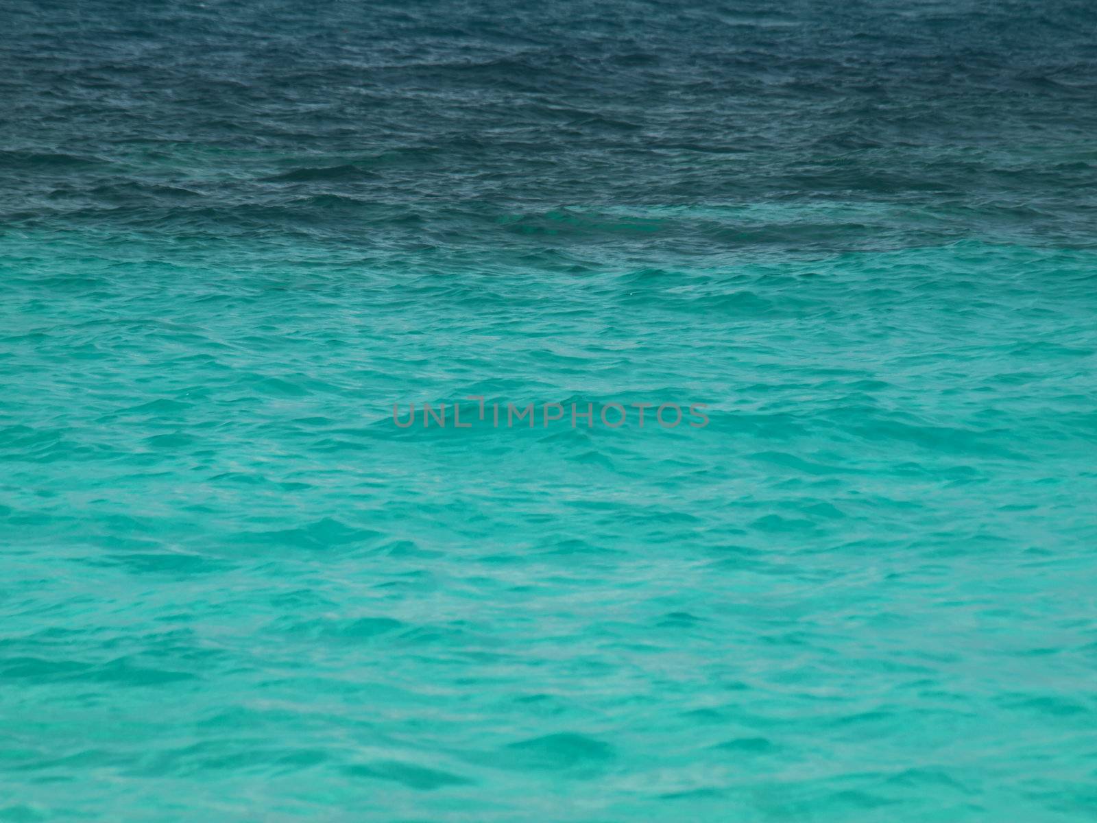 Background of beautiful turquoise tropical waters with corals in Malaysia