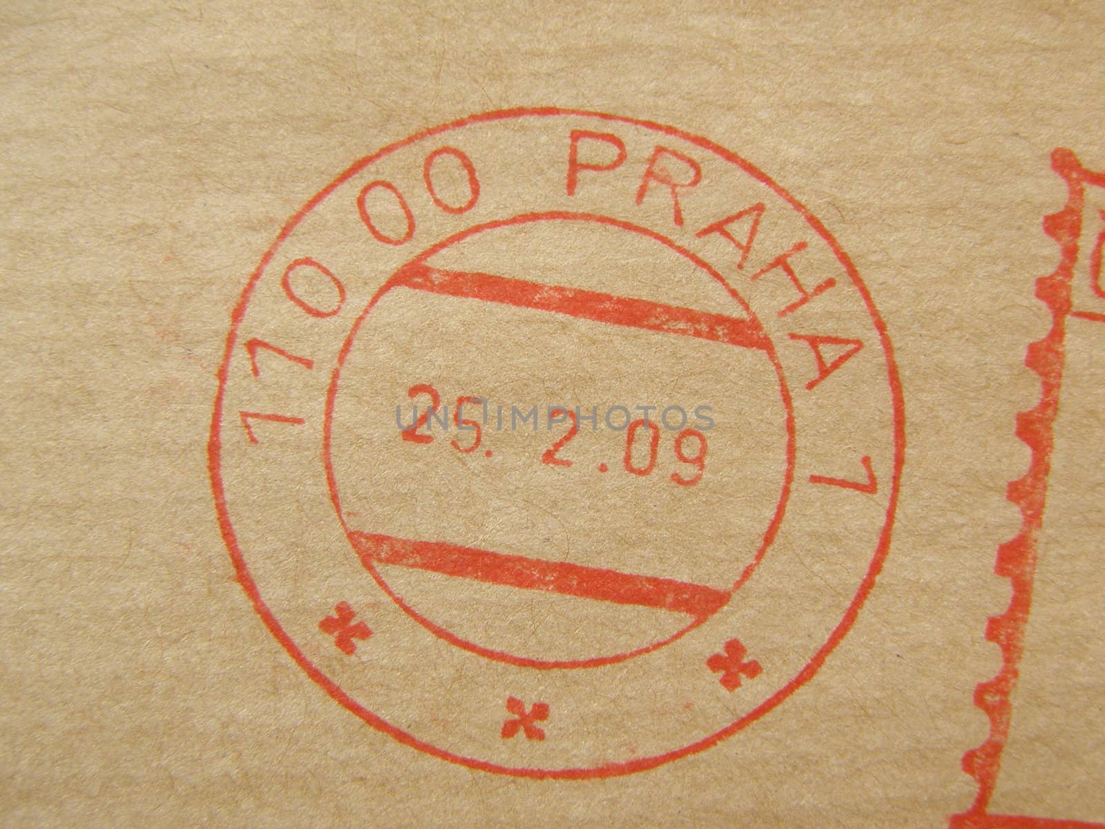 red ink postage meter from Prague over brown envelope