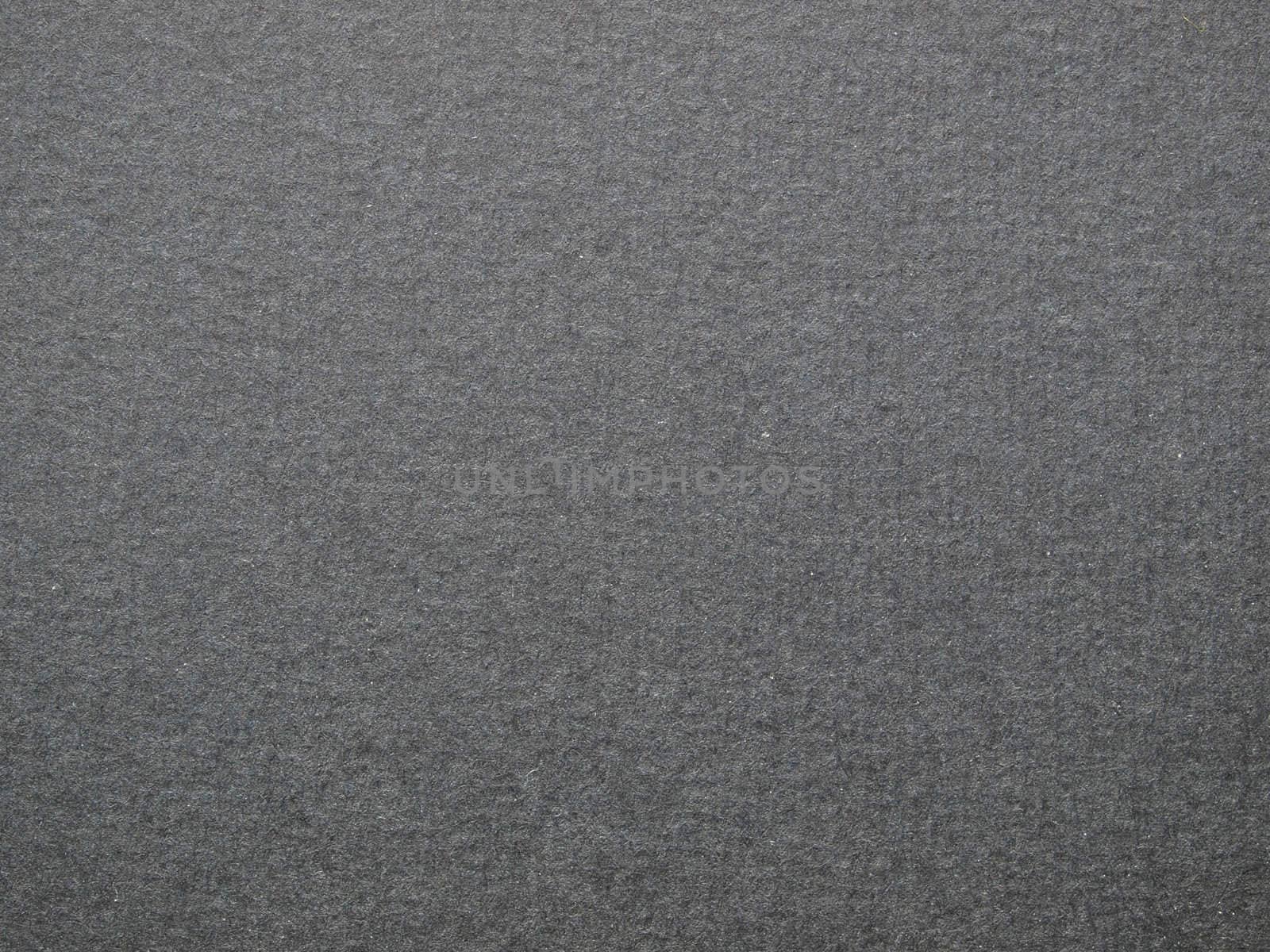 A dark grey cardboard useful as a background