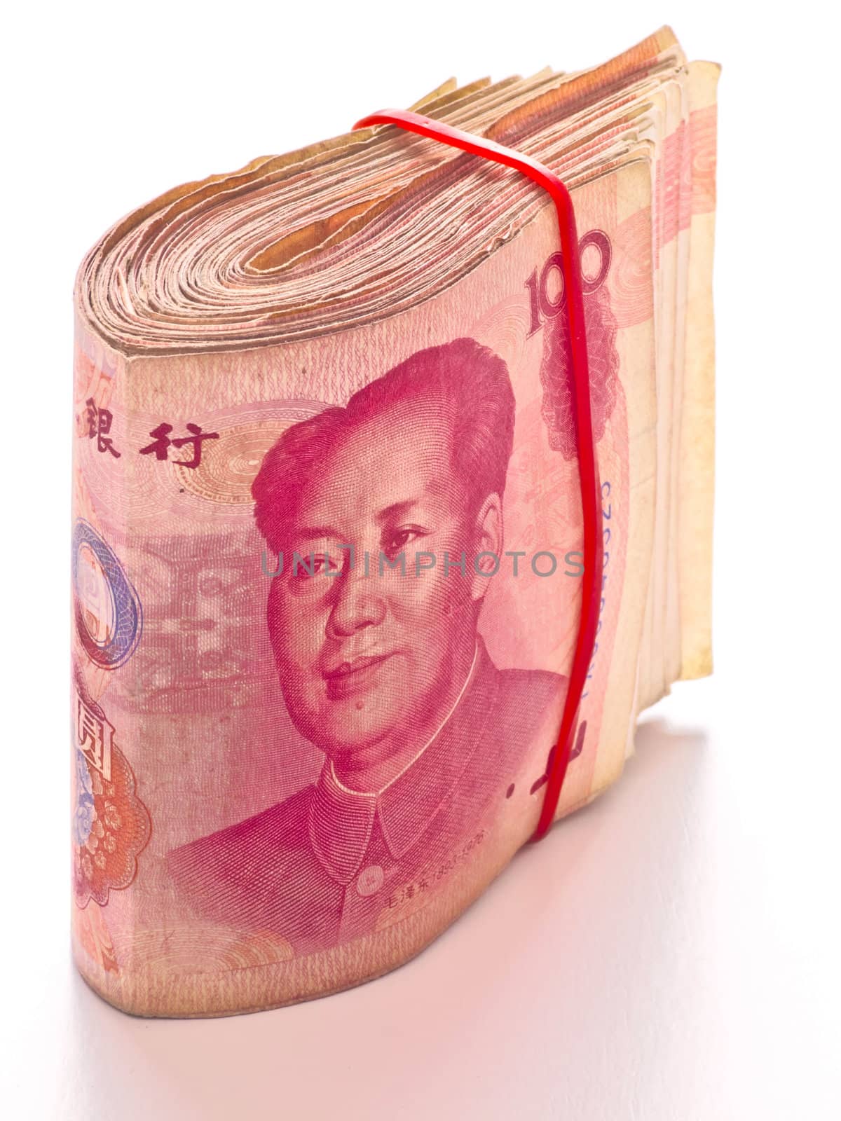 close up of a wad of chinese yuan