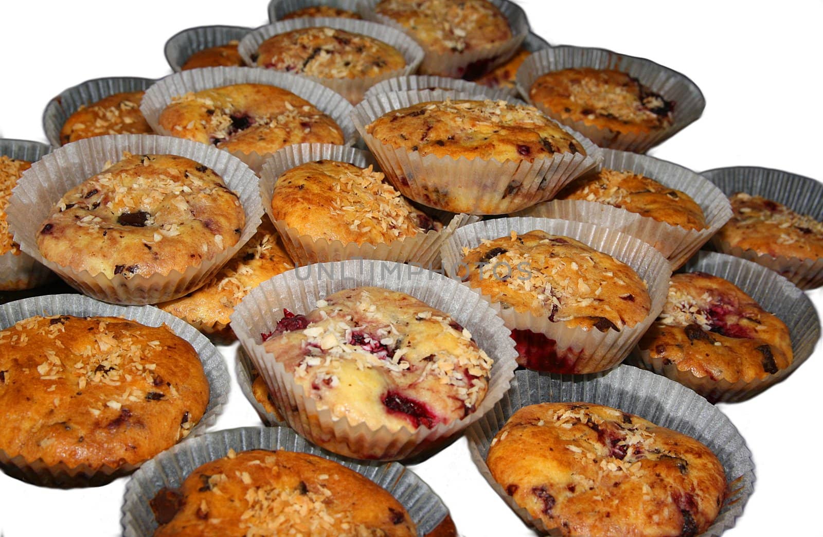 Blueberry muffins isolated on white by sundaune