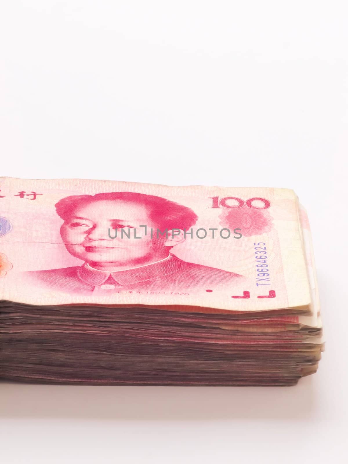 close up of a stack of chinese yuan