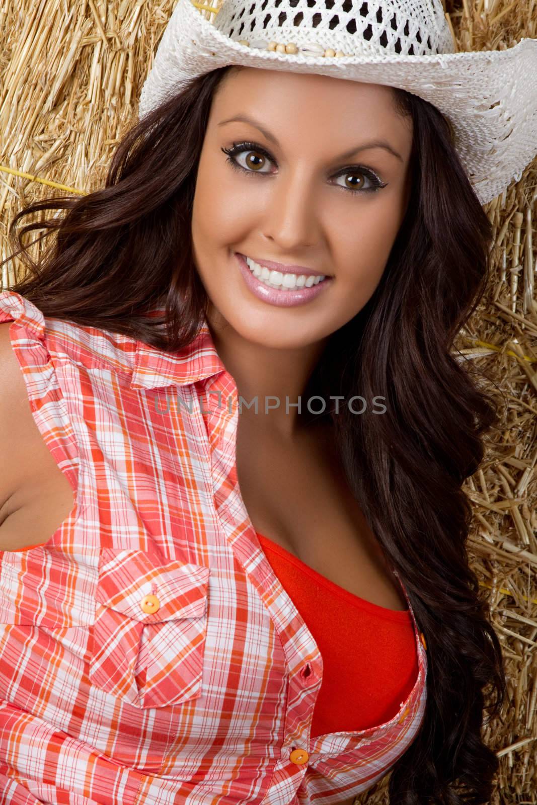 Beautiful country girl wearing hat