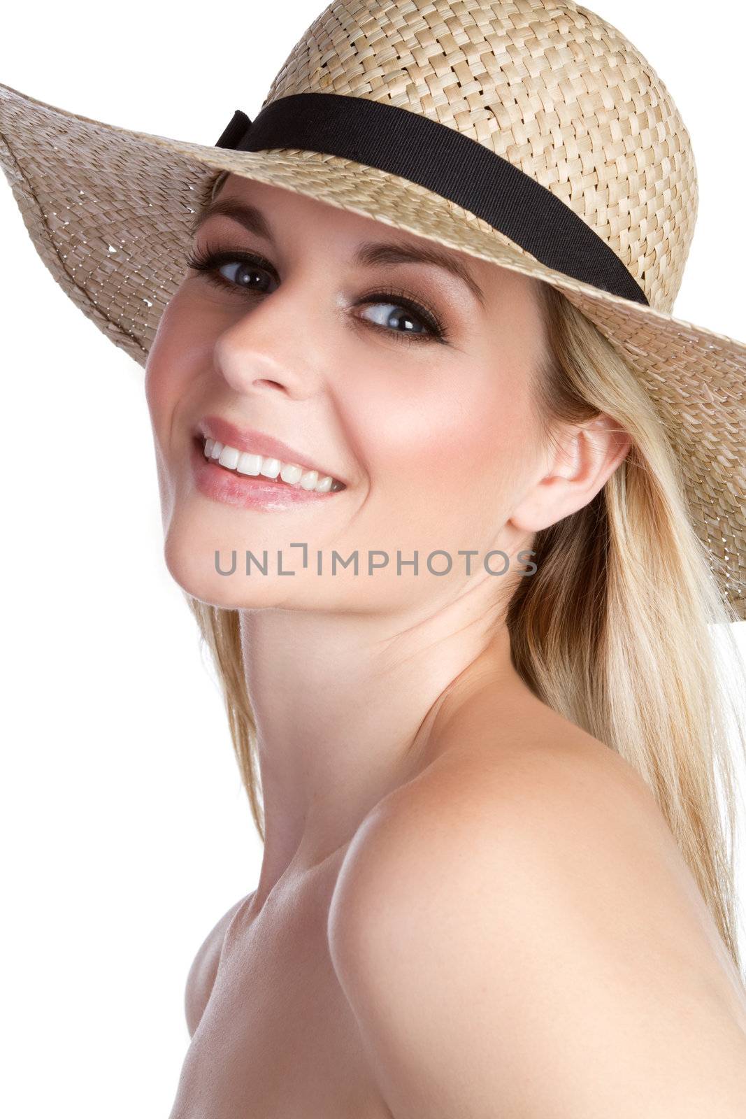 Smiling blond woman wearing hat