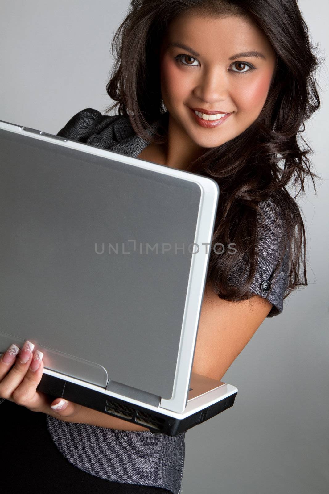 Asian woman using laptop computer