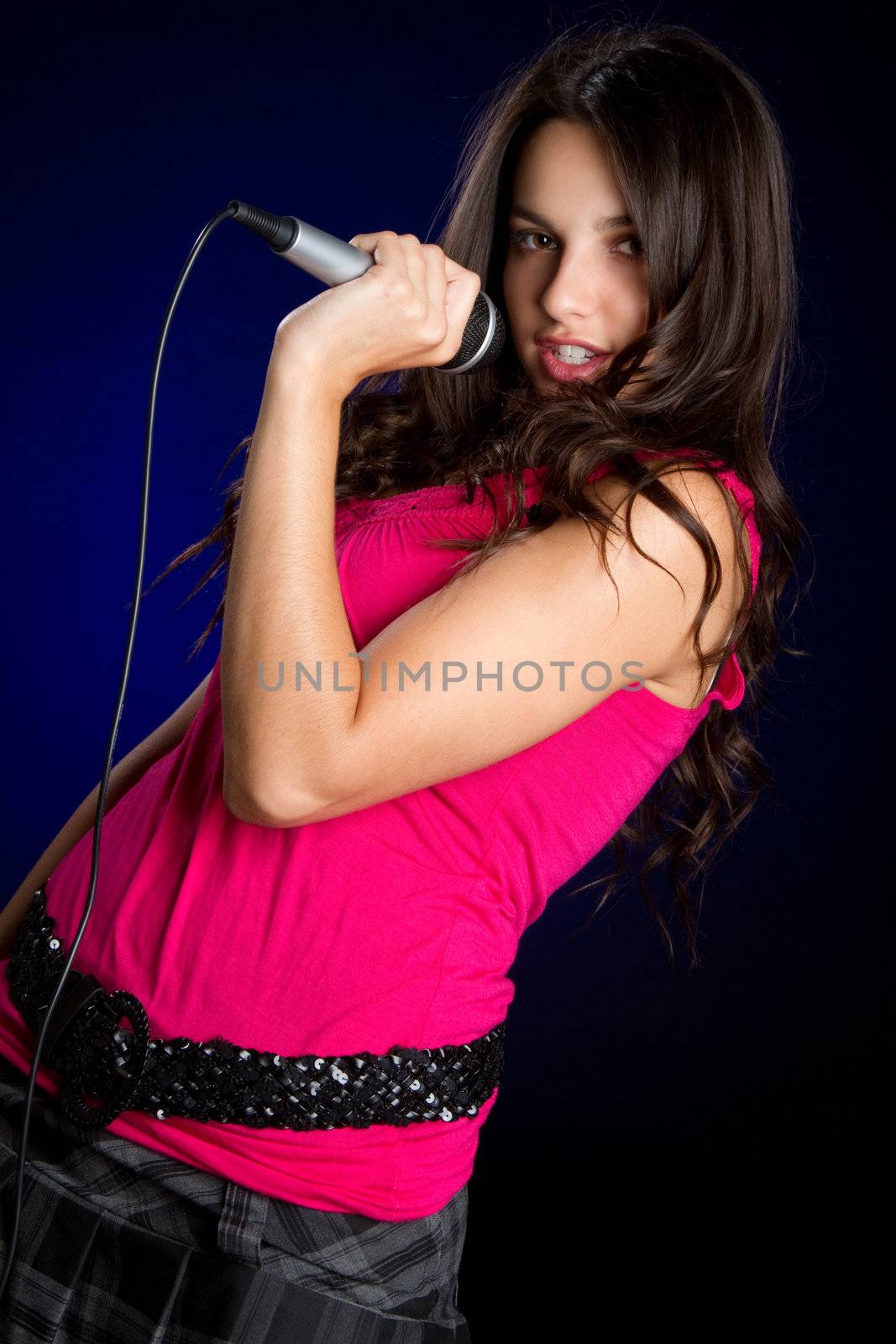 Beautiful teen girl singing