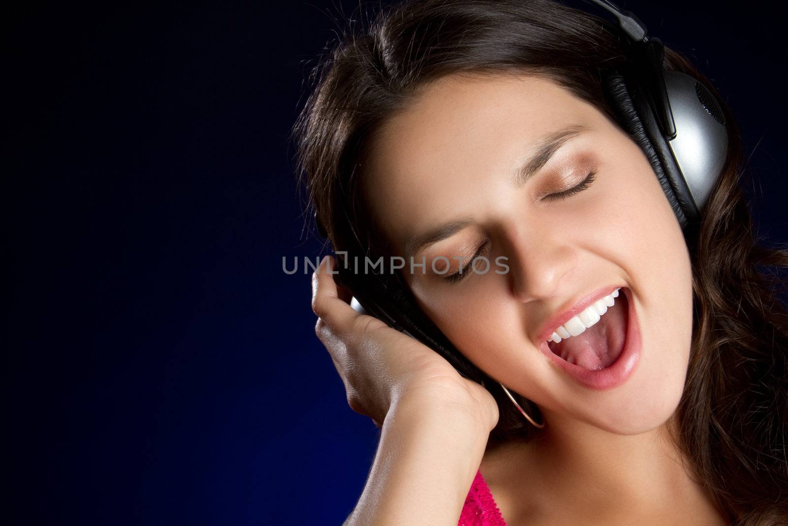 Teen girl listening to headphones music