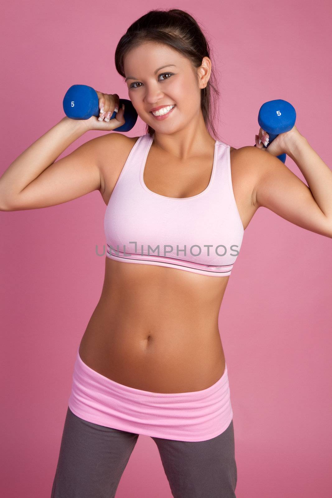 Beautiful smiling asian fitness woman