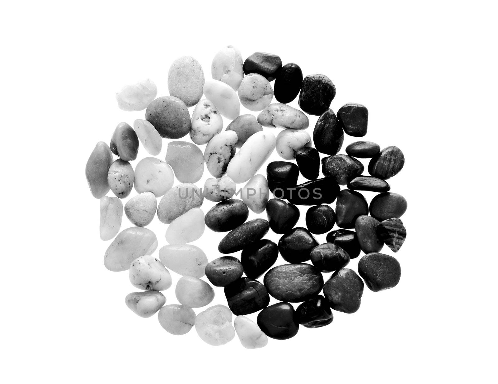 Yin Yang symbol made from beach pebble, isolated on white