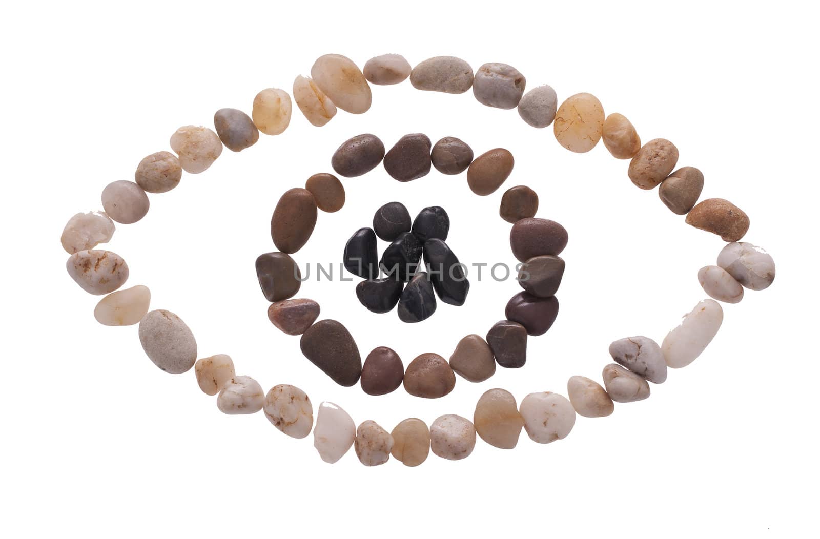 An eye made out of beach pebbles isolated on the white