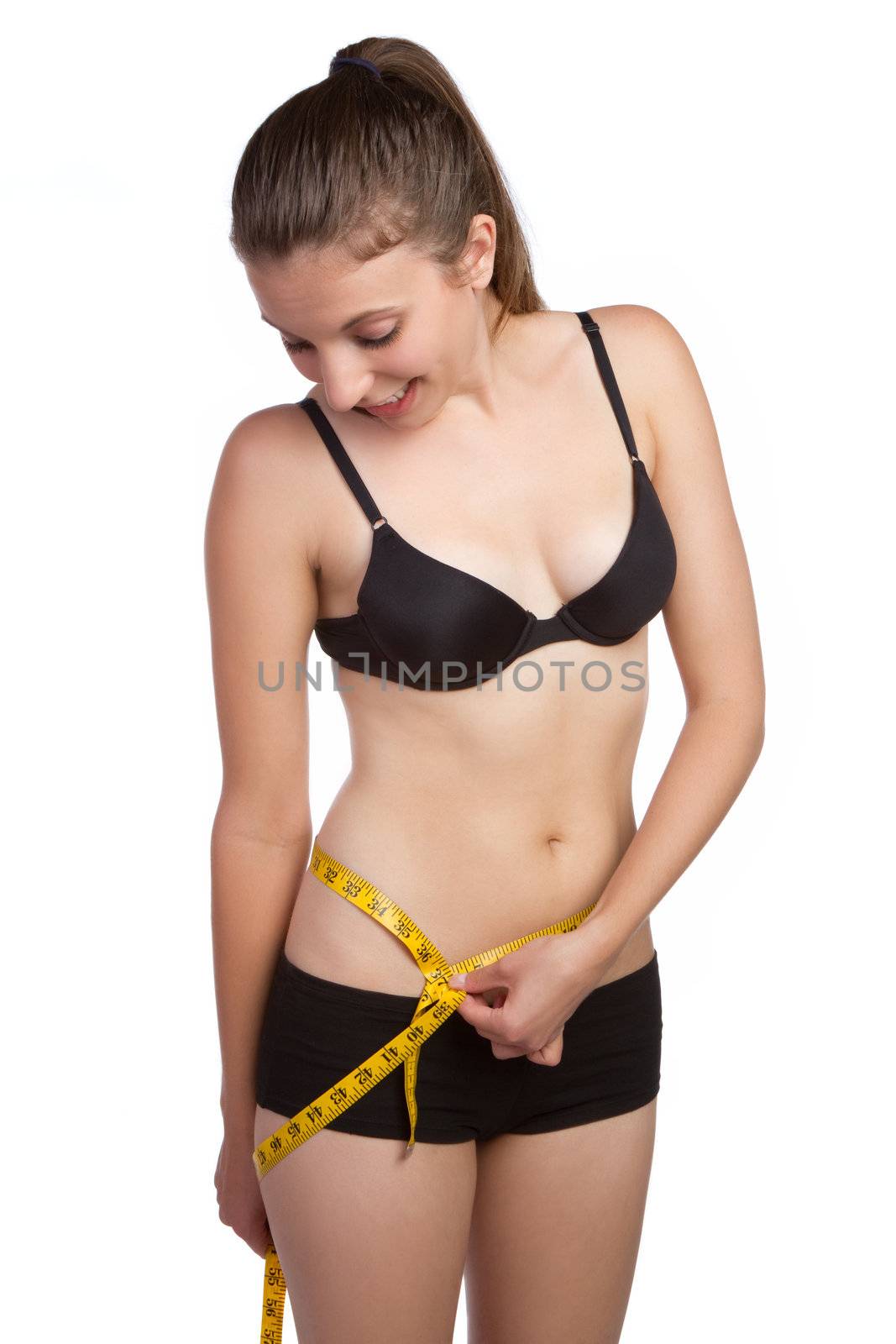 Weight loss woman measuring waist