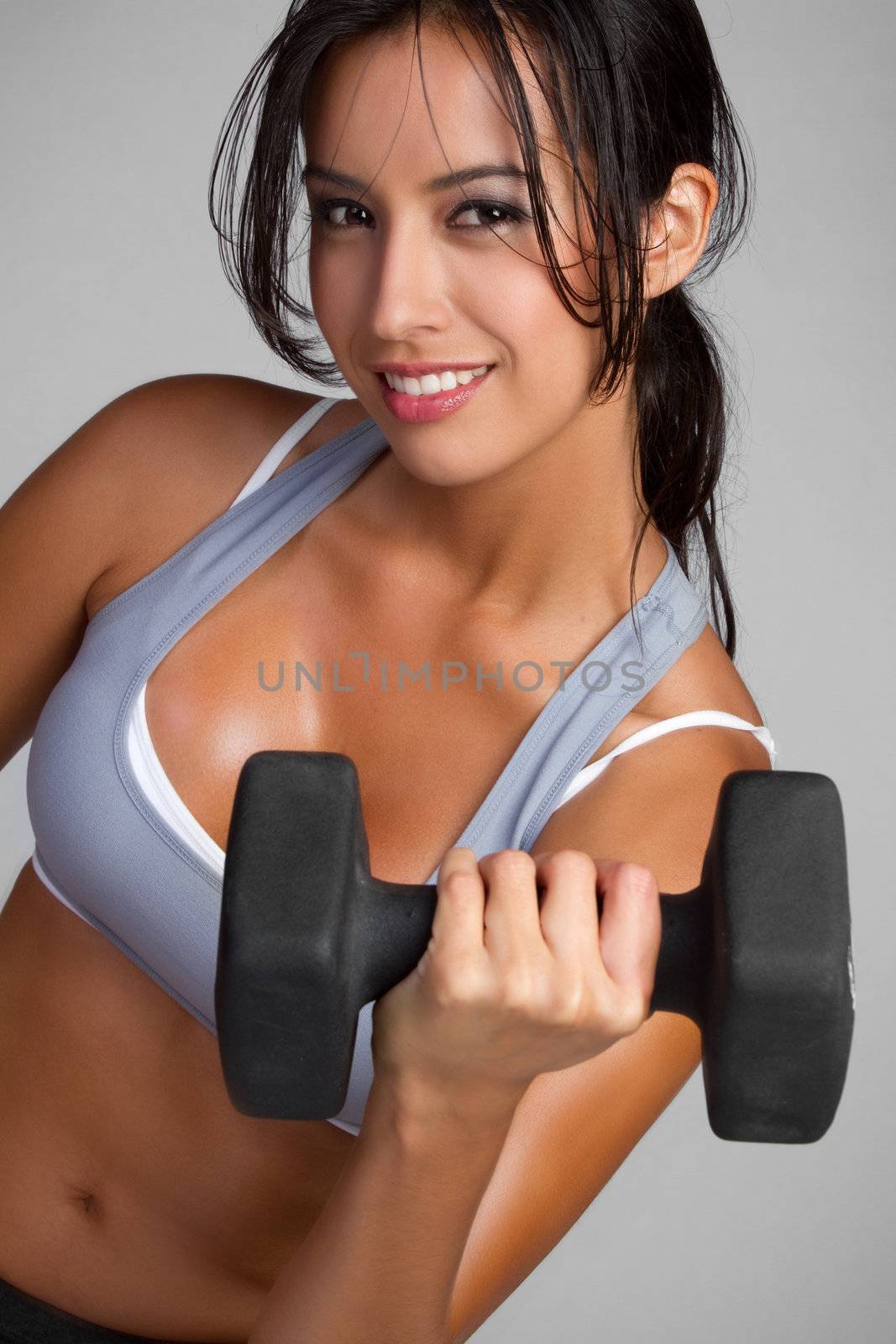 Beautiful smiling latina fitness woman