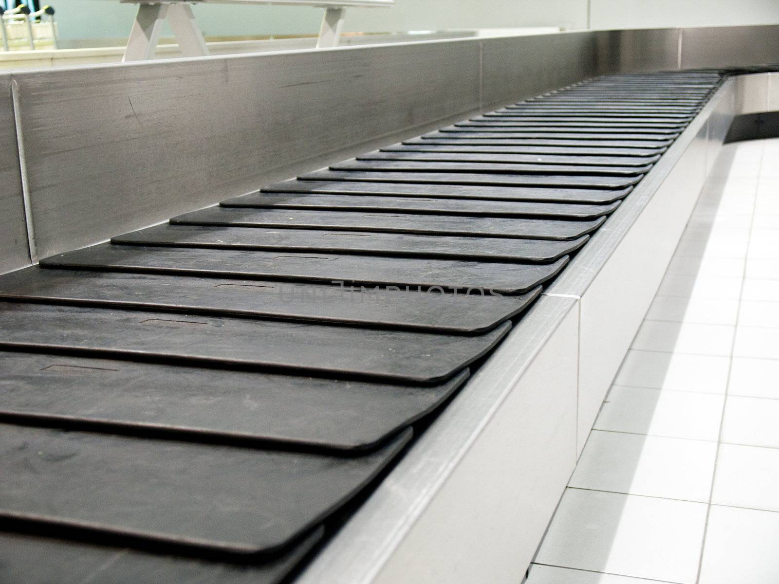 Baggage transportation belt at an airport