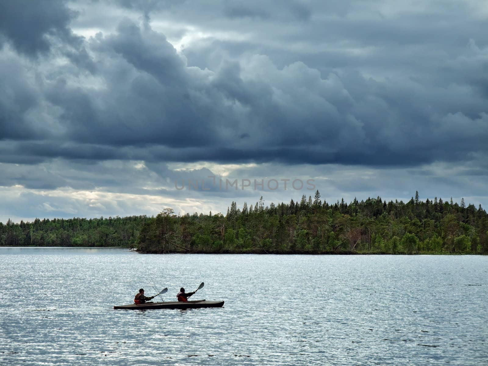 canoe travel on lake at light northern night