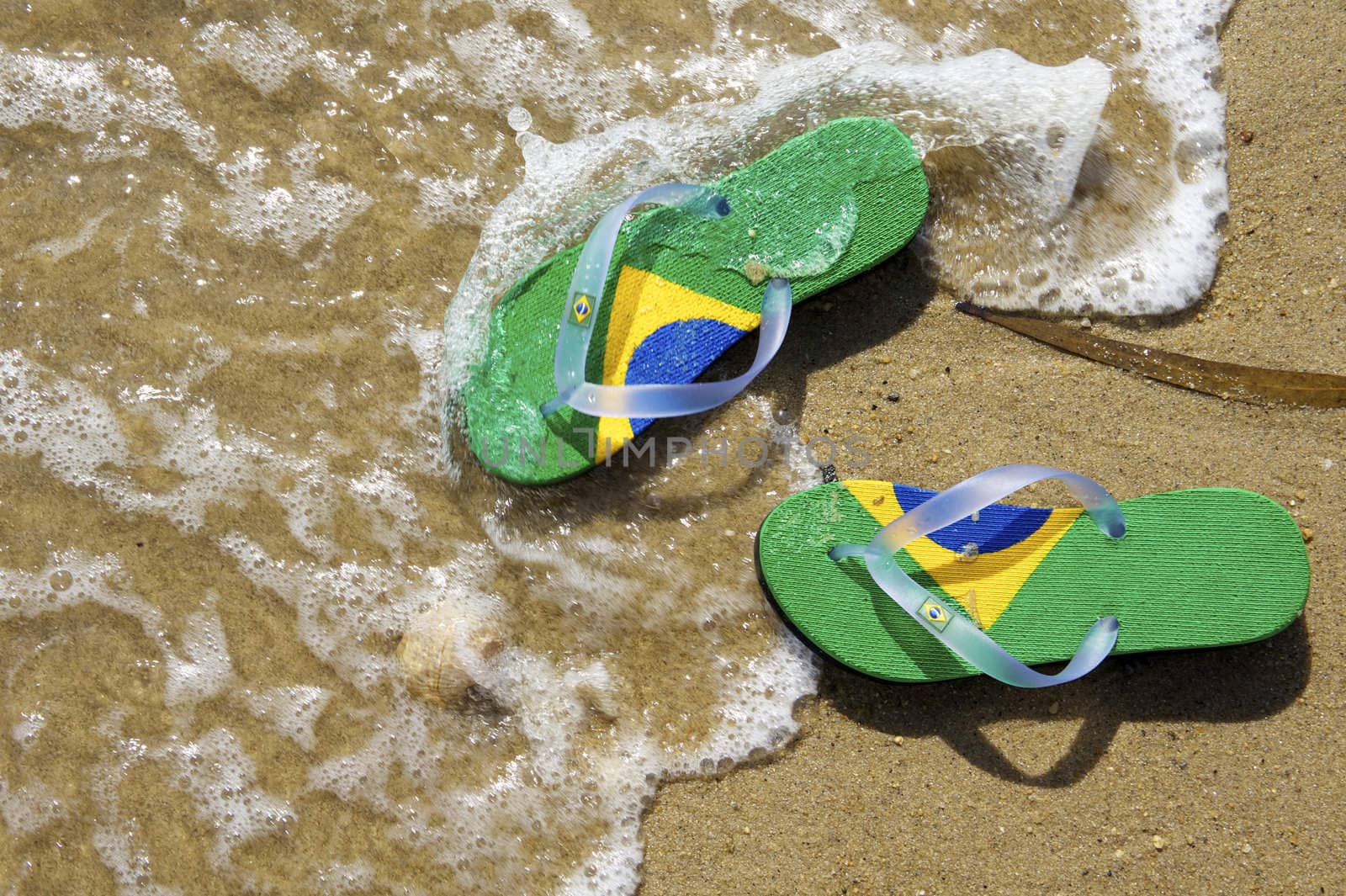 razilian Flipflop on the beach in Ilhabela, Sao Paulo state, Brazil, RAW shooting