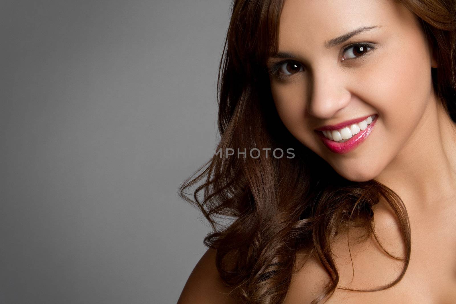 Beautiful young hispanic girl smiling