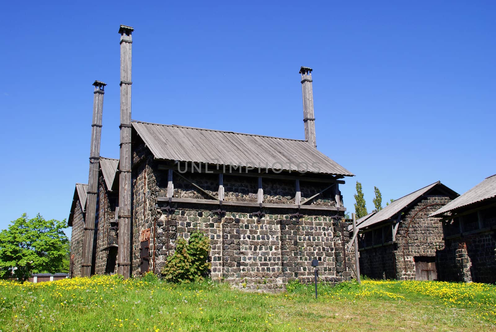 Historic Charcoal ovens in Dalsbruk, South of Finland, on a sunny day.