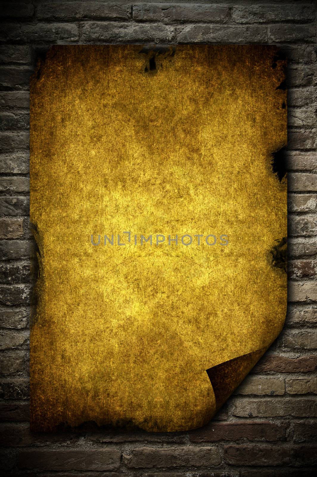 Grunge yellow paperon a wall of brick