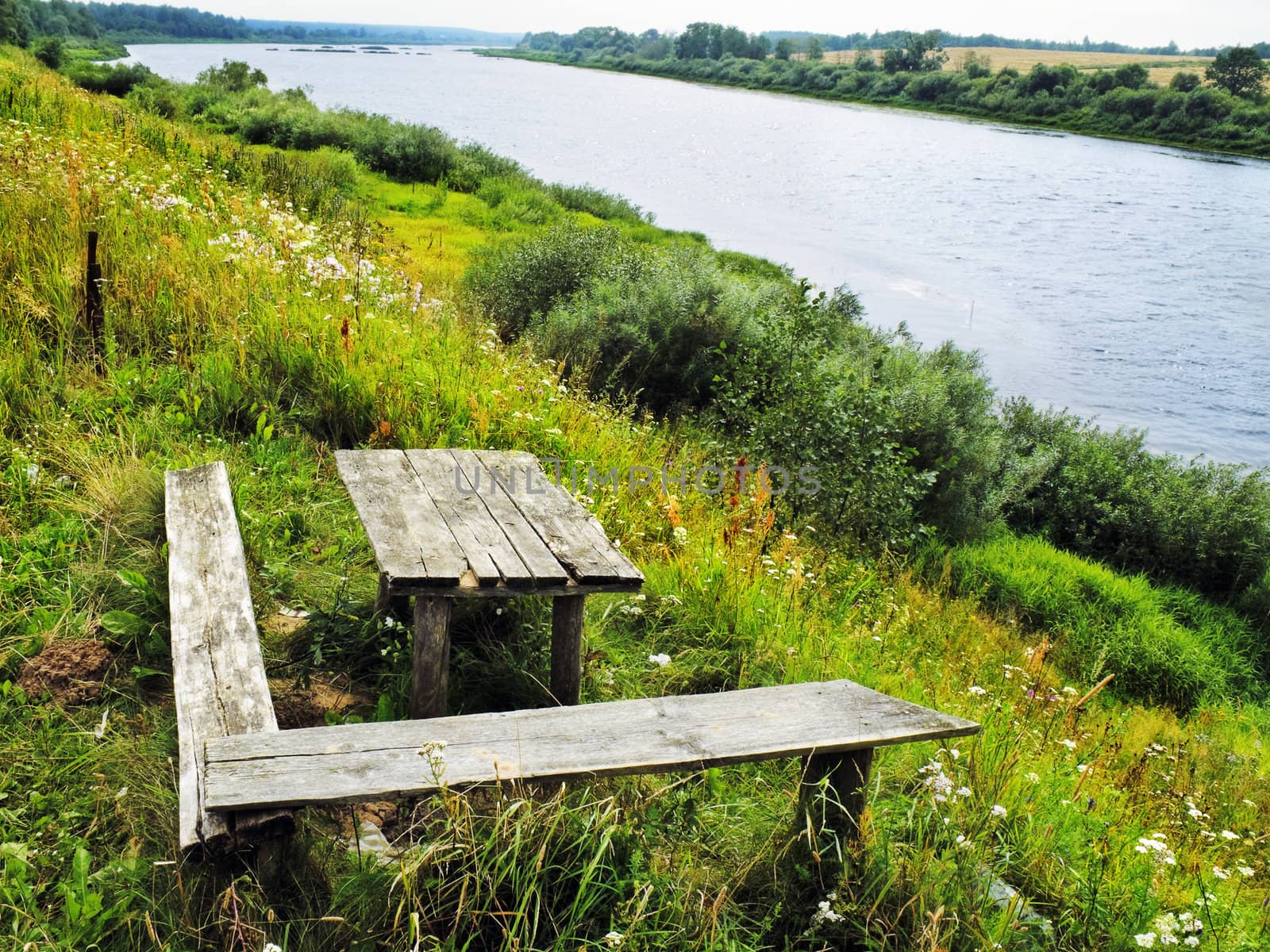 Table and benches for rest near the river