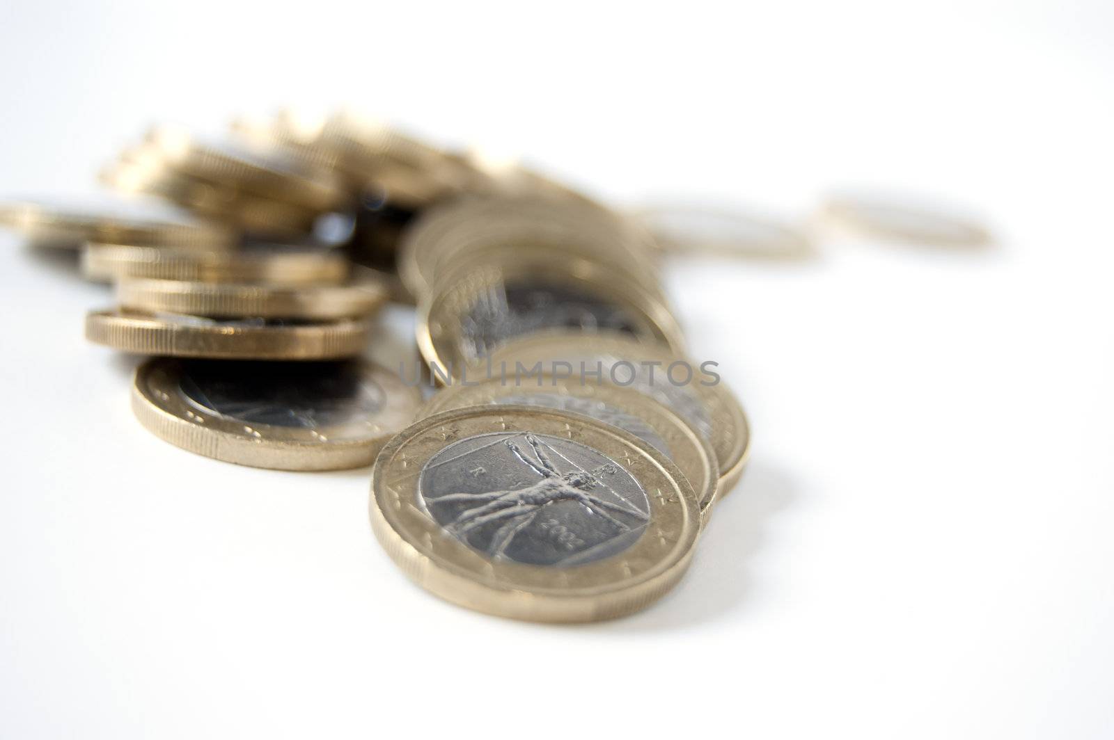 Many coins isolated on white background