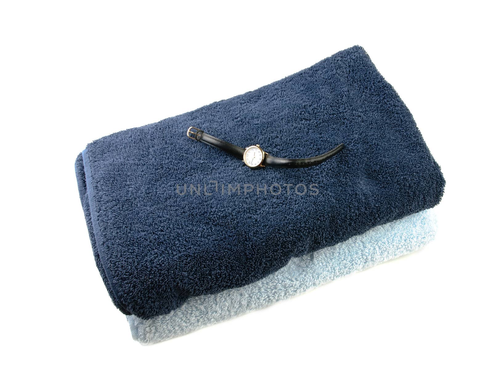 Bath time concept with two towels and a watch, isolated against a white background.