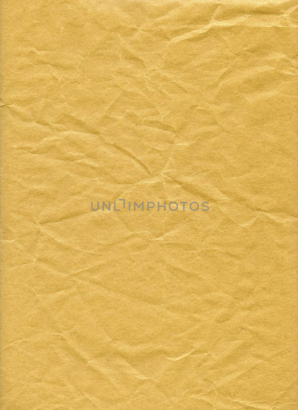 An isolated old grunge yellow paper folded