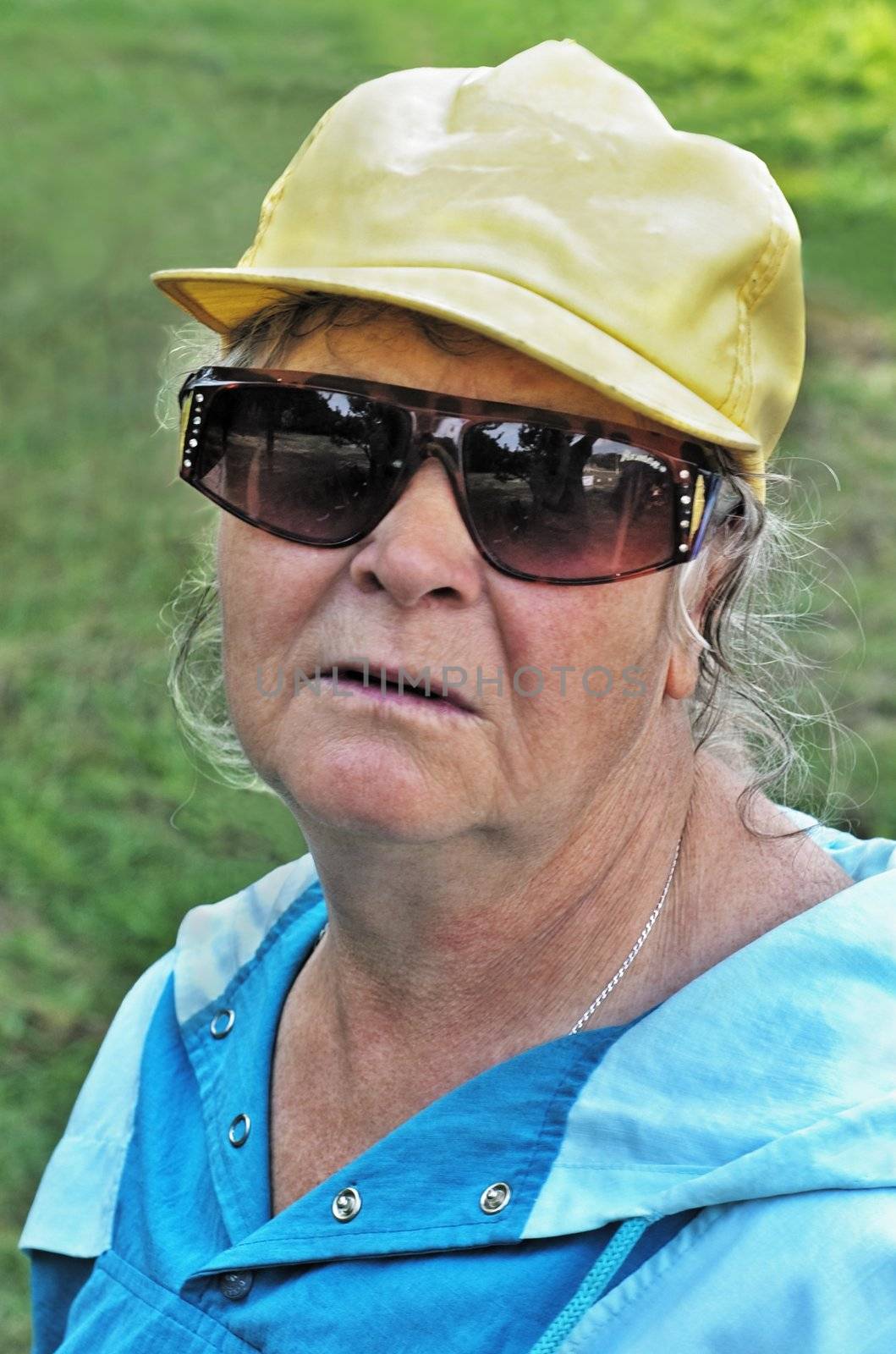 portrait elderly women in brown glasses