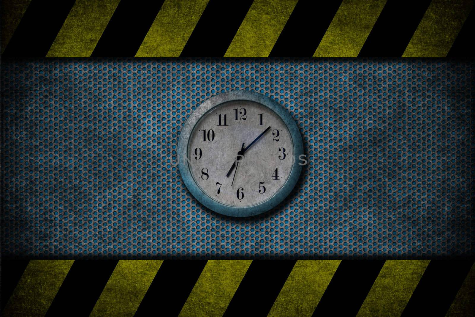 A grunge image with blue and white clock on metal