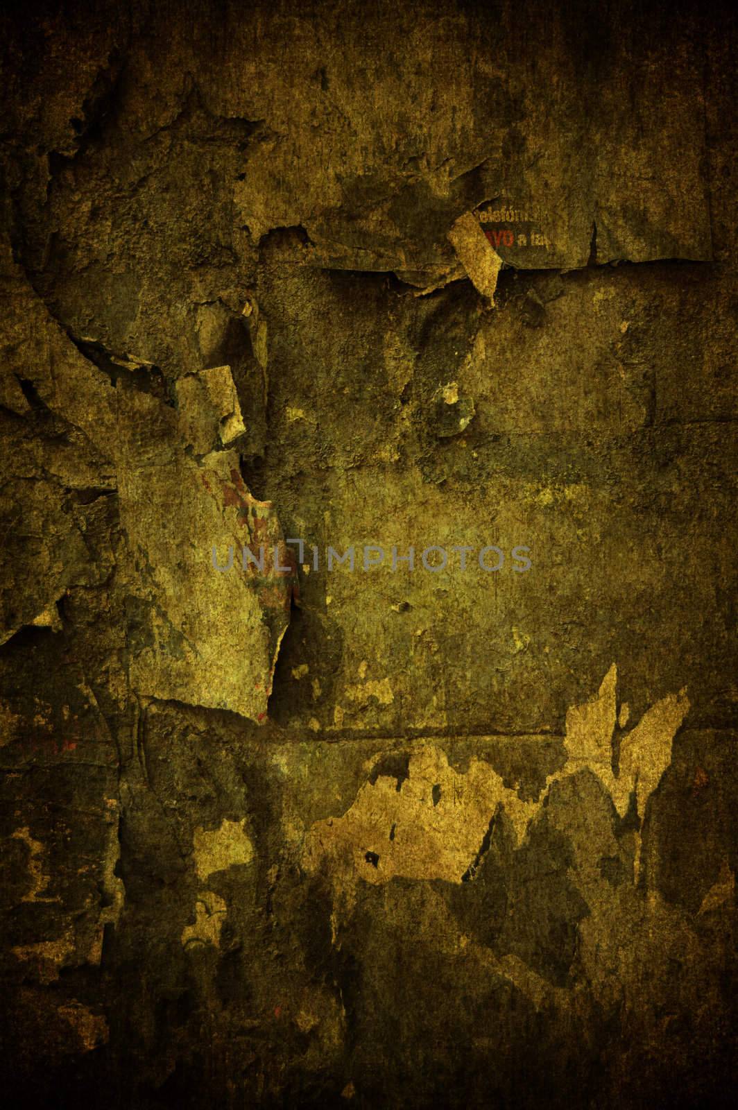 A cracked grunge concrete background with papers