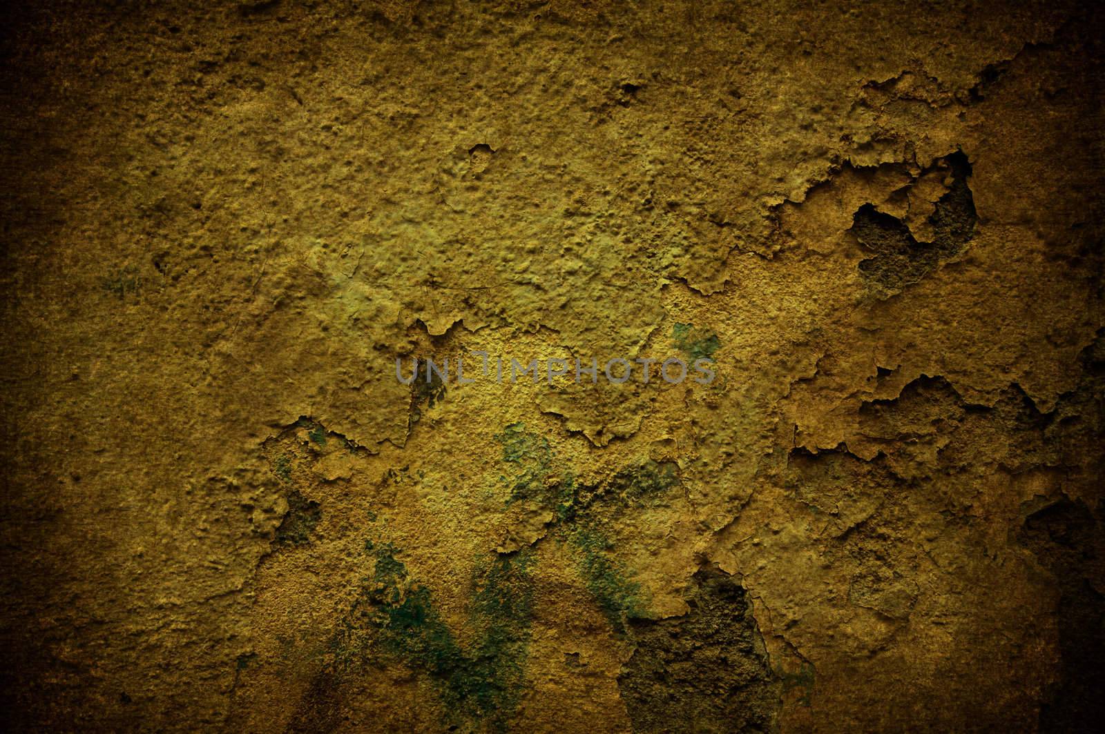 A cracked light yellow grunge concrete background