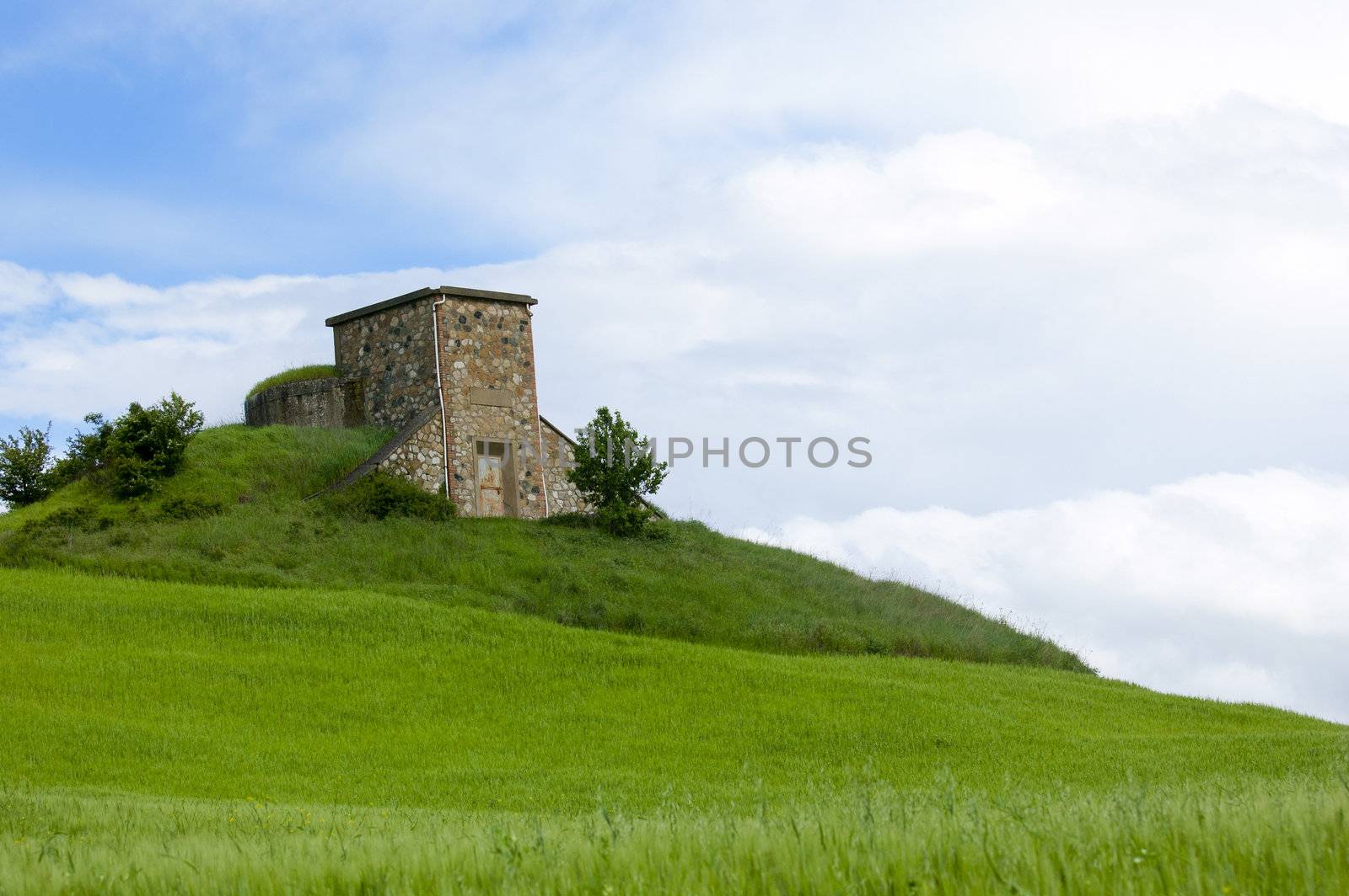An aged house on top of a hill