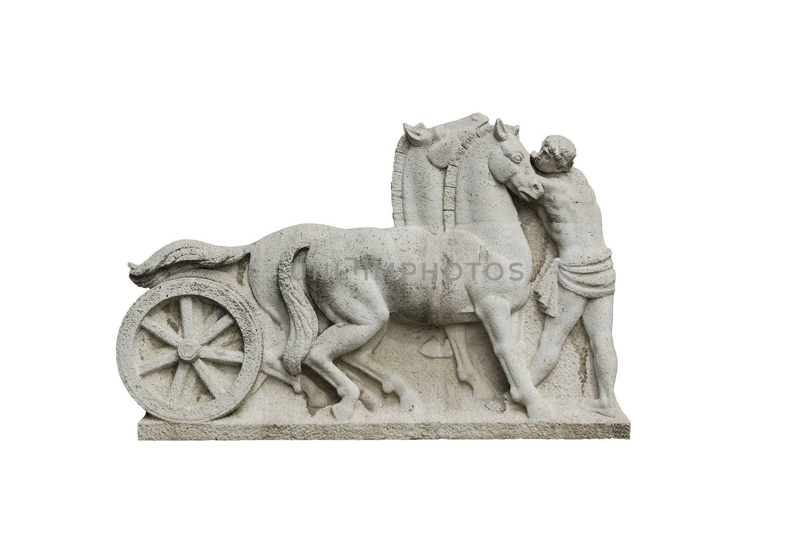 An old statue with two horses and a man