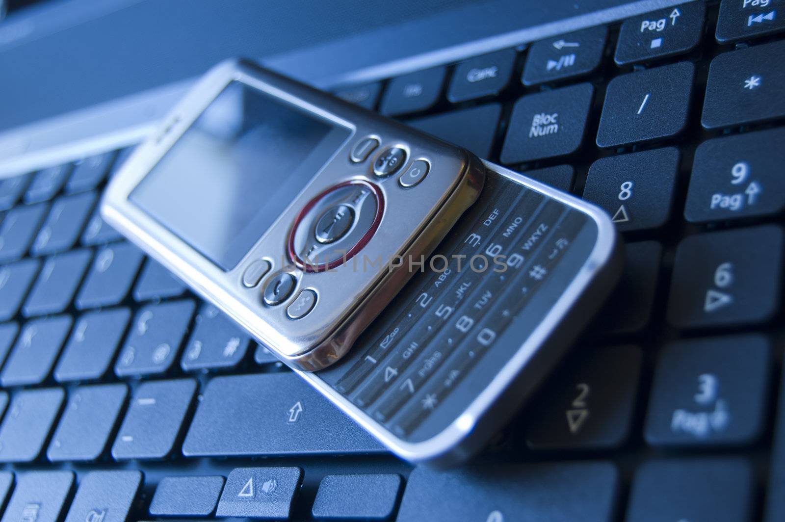 Cellular on a keyboard of a black laptop