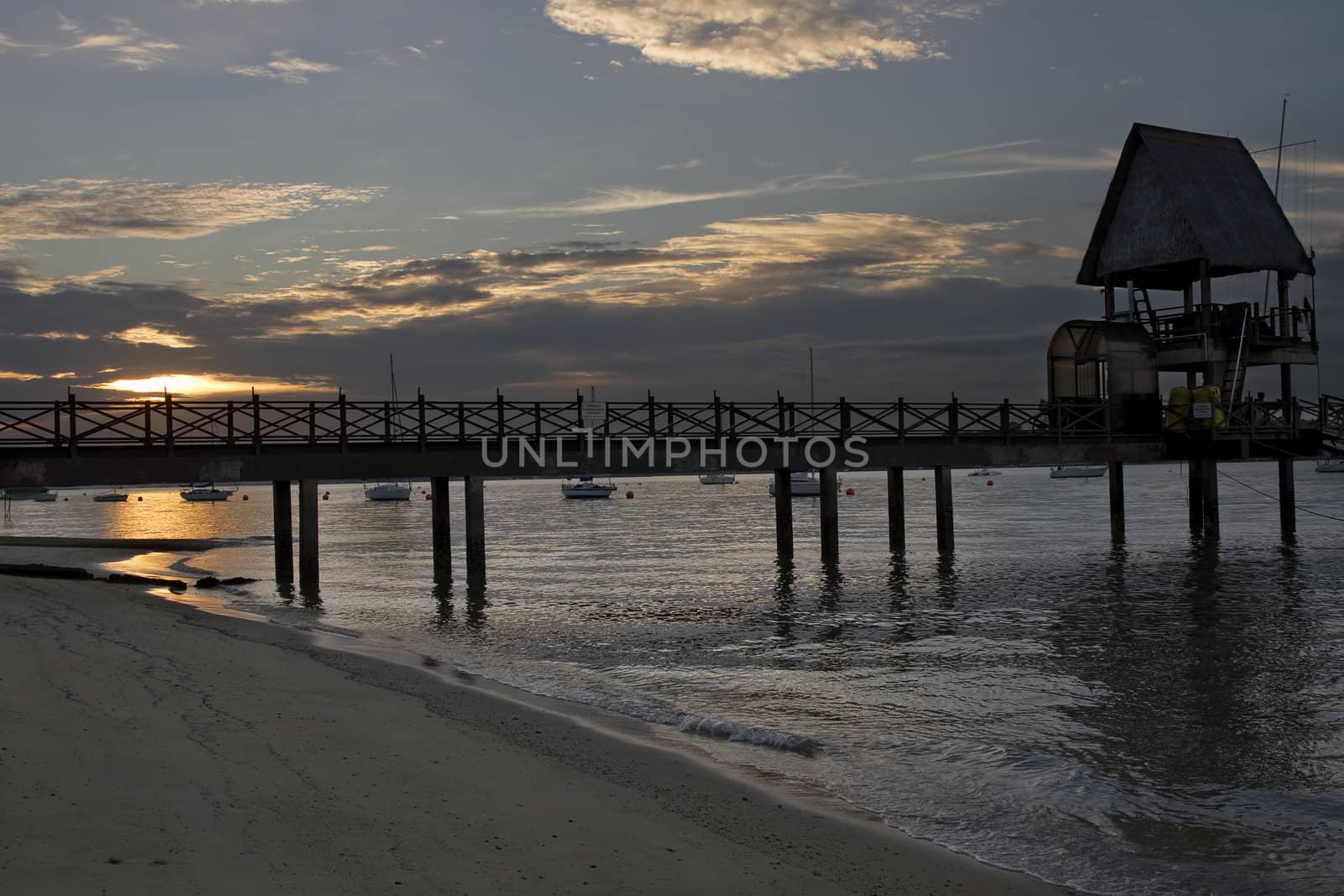 Sunset at the Beach on the Jetty Pier

