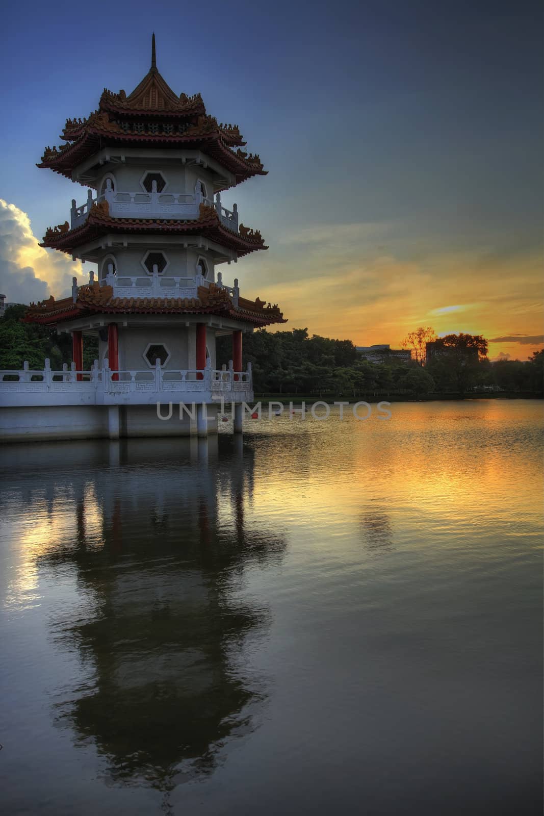 Sunset at Singapore Chinese Garden by Pagoda on the Lake