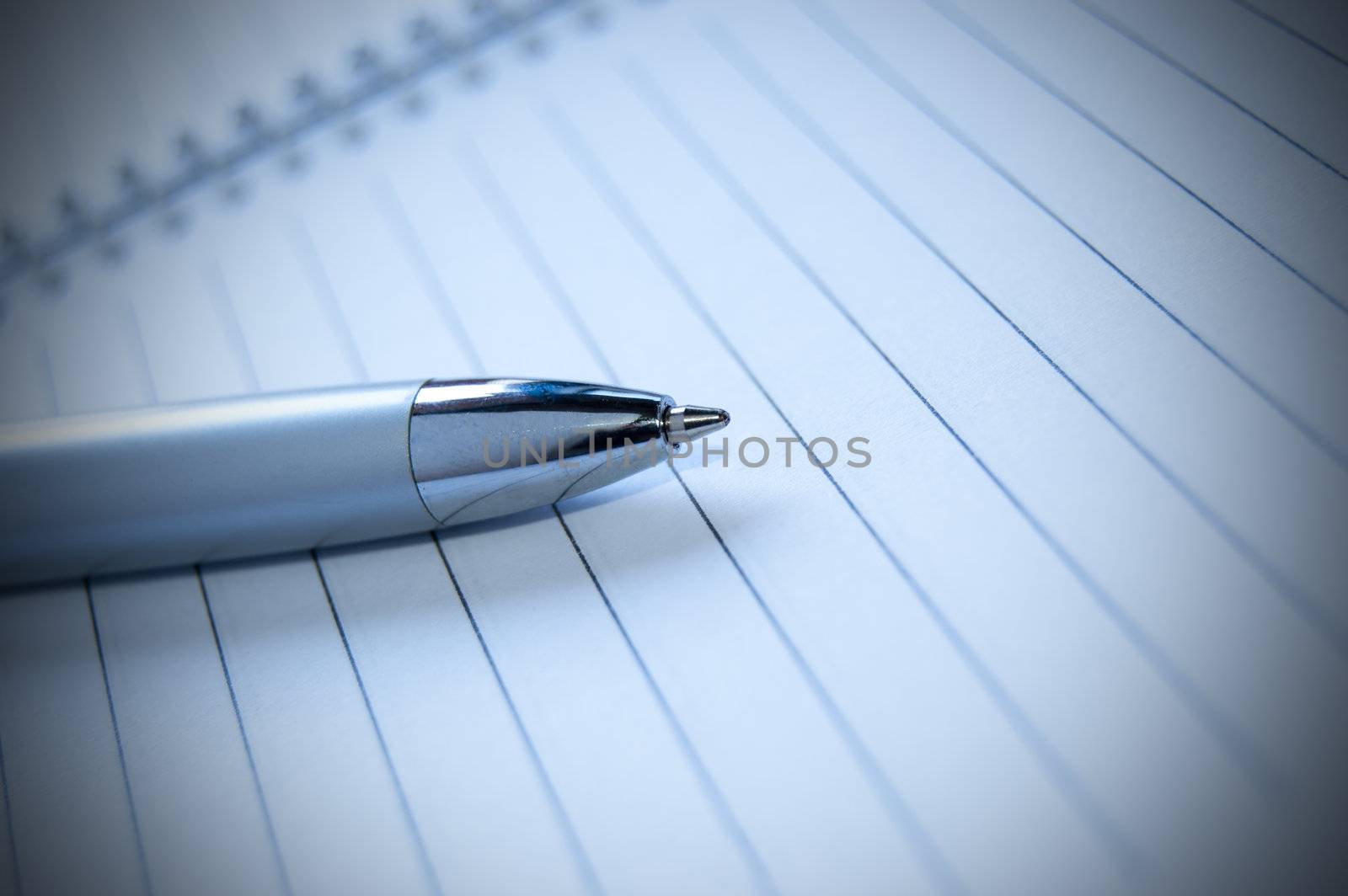 An elegant pen on a white book