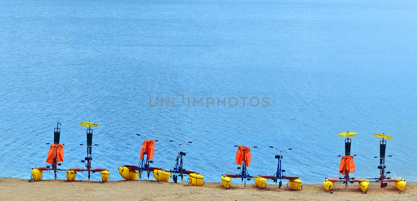 Few pedalos parked on the beach